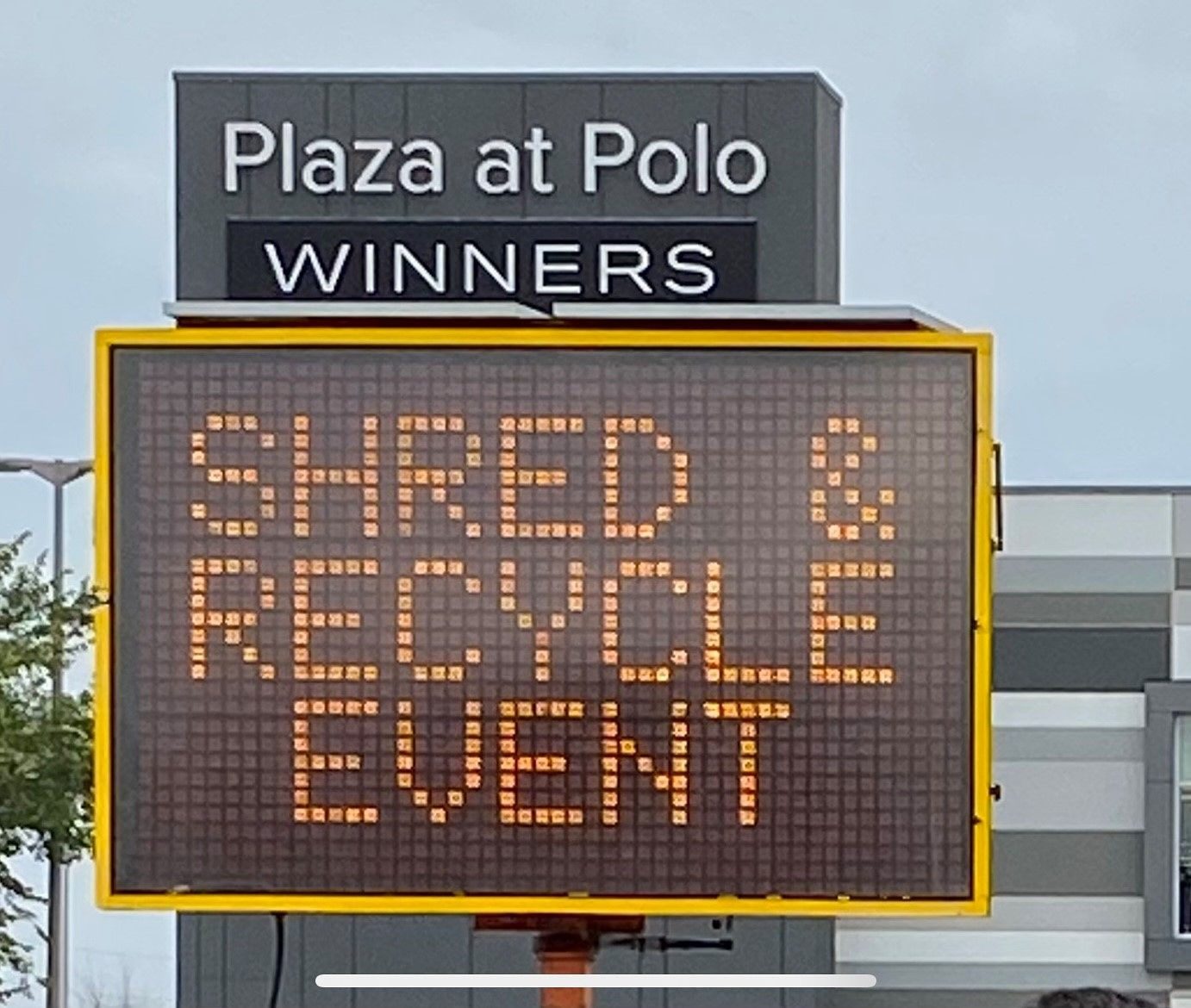Community event sign inviting people to recycle electronics