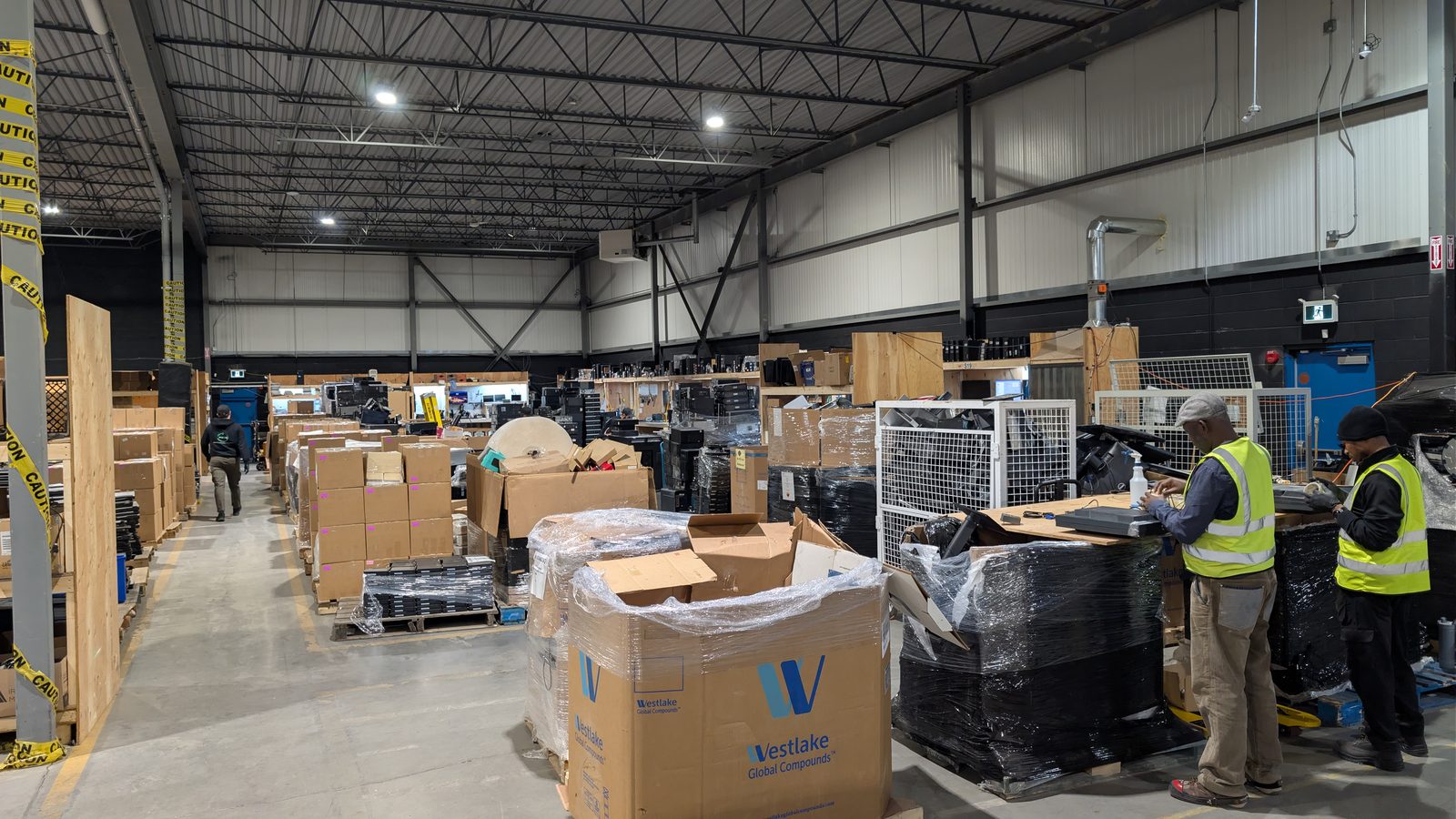 ERA staff handling enterprise technology inside a processing facility